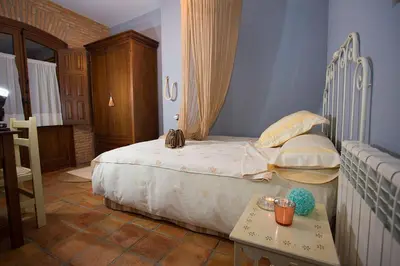 Cama o camas de una habitación en Casa Rural El Tenado