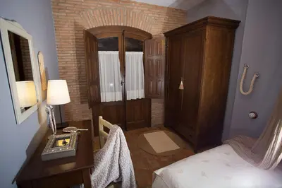Cama o camas de una habitación en Casa Rural El Tenado