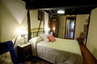 Cama o camas de una habitación en Apartamentos Rurales Tía Josefa