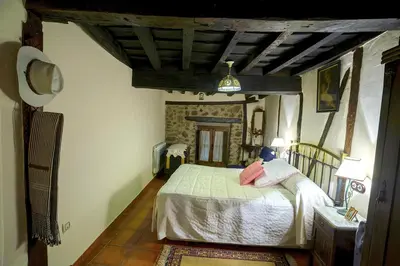 Cama o camas de una habitación en Apartamentos Rurales Tía Josefa
