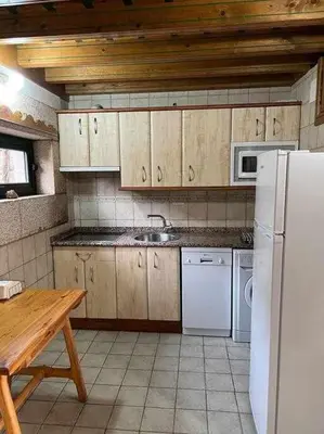 Una cocina o zona de cocina en Vistas espectaculares en nuestro Apartamento EL Carpintero