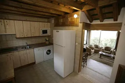 Una cocina o zona de cocina en Vistas espectaculares en nuestro Apartamento EL Carpintero