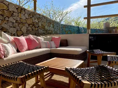 Una televisión o centro de entretenimiento en CASA RURAL MOLINO DEL JERTE