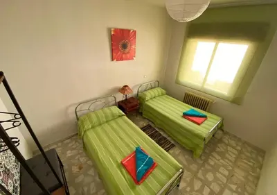 Cama o camas de una habitación en CASA LOS PILARES