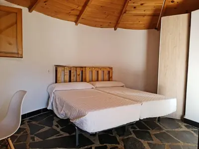 Cama o camas de una habitación en Chozos Las Flores de la Dehesa