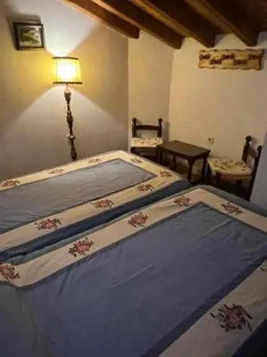 Cama o camas de una habitación en Tía Clotilde es una casa grande ideal para familias y grupos de amigos