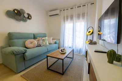 Una televisión o centro de entretenimiento en Apartamento Boutique Plasencia Centro