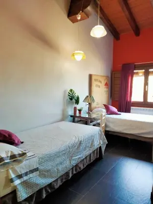 Cama o camas de una habitación en En Huerto de Catalina