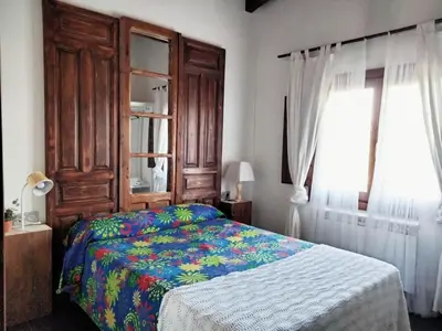 Cama o camas de una habitación en En Huerto de Catalina