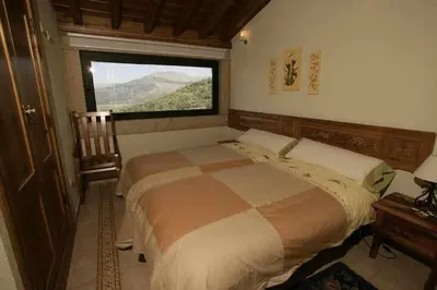 Cama o camas de una habitación en Apartamento Rural El Labrador es un cómodo y acogedor apartamento.