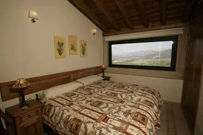 Cama o camas de una habitación en Apartamento Rural El Labrador es un cómodo y acogedor apartamento.