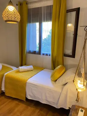 Cama o camas de una habitación en Apartamento rural Prunus avium