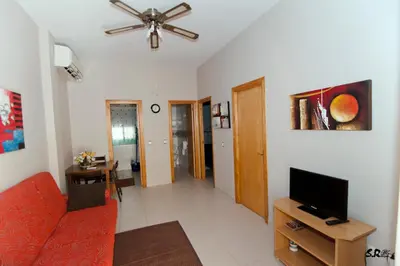 Una televisión o centro de entretenimiento en Camping las Catalinas