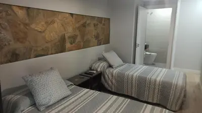 Cama o camas de una habitación en Alcazaba - Free Parking