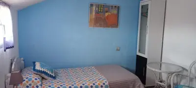 Cama o camas de una habitación en EL DESVÁN