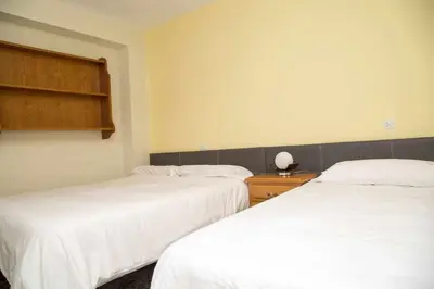 Cama o camas de una habitación en El Olivar Agloipe Ahigal -TR-CC-00517-