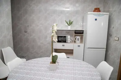Una cocina o zona de cocina en El Olivar Agloipe Ahigal -TR-CC-00517-