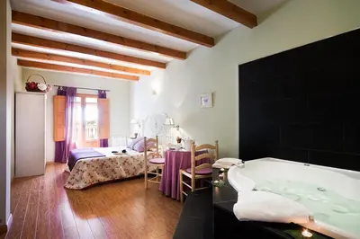 Cama o camas de una habitación en Casa Rural Miel y Romero