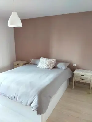 Cama o camas de una habitación en El balcón de Alba