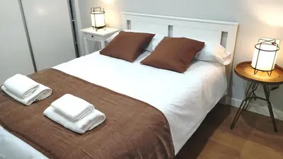 Cama o camas de una habitación en VuT BALBOA APARTAMENTO