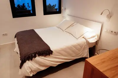 Cama o camas de una habitación en Apartamentos Plaza de España 6