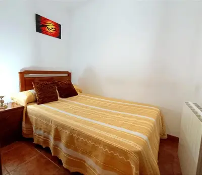 Cama o camas de una habitación en Casa Raspa