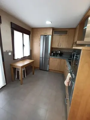 Una cocina o zona de cocina en Piso Rualte