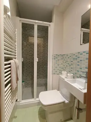 Un baño de Piso Rualte