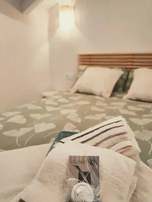 Cama o camas de una habitación en La casita del olivo