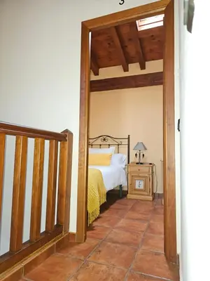 Cama o camas de una habitación en Casa Rural El Campanario