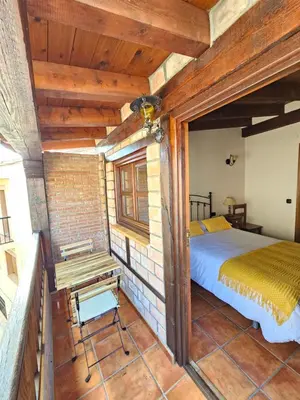 Cama o camas de una habitación en Casa Rural El Campanario