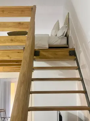 Cama o camas de una habitación en Puerta de Caceres Apartamento 3
