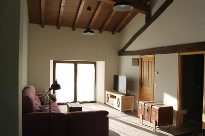 Una televisión o centro de entretenimiento en Casa Rural Abuela Luci