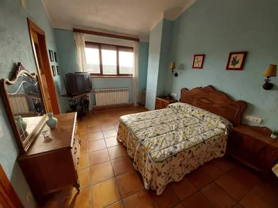 Cama o camas de una habitación en Casa Rural El Callejo