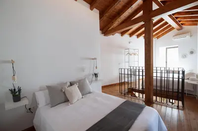 Cama o camas de una habitación en El Postigo