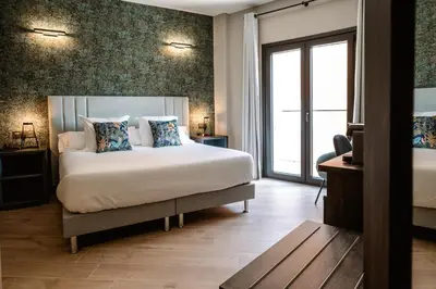 Cama o camas de una habitación en Hotel GilMar Orellana la Vieja