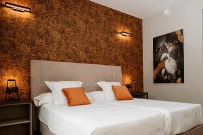 Cama o camas de una habitación en Hotel GilMar Orellana la Vieja