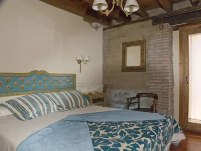 Cama o camas de una habitación en La Posada del Tiétar