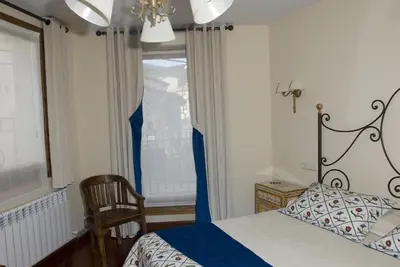 Cama o camas de una habitación en La Posada del Tiétar