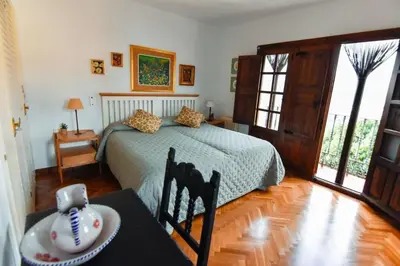 Cama o camas de una habitación en Casa Rural El Mirador del Pico