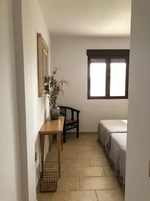 Cama o camas de una habitación en Casa Rural encantos de Orellana