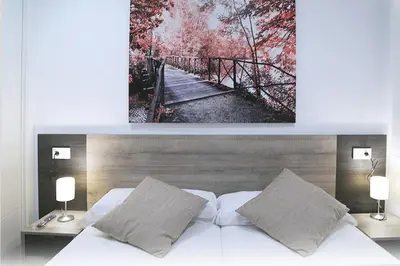 Cama o camas de una habitación en Piso Plaza Mercado 3,4