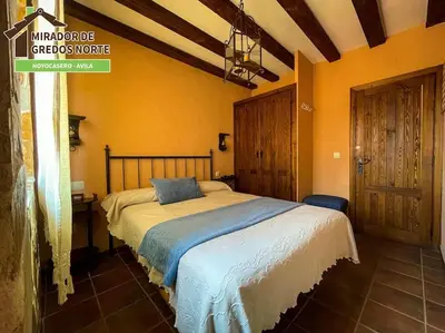 Cama o camas de una habitación en Casa el Mirador de Gredos Norte