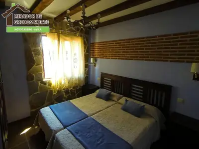 Cama o camas de una habitación en Casa el Mirador de Gredos Norte