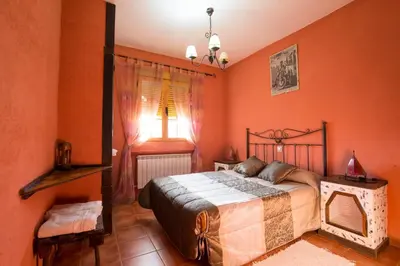 Cama o camas de una habitación en El Robledillo