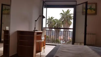 Cama o camas de una habitación en Apartamentos Las Huertas