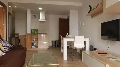 Una televisión o centro de entretenimiento en Apartamentos Las Huertas