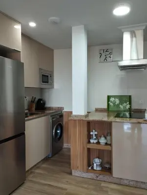 Una cocina o zona de cocina en Apartamentos Las Huertas