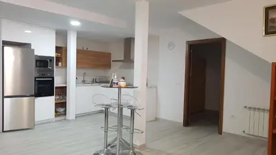 Una cocina o zona de cocina en Apartamentos Las Huertas