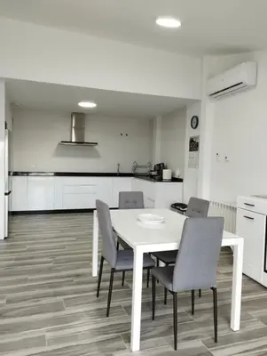 Una cocina o zona de cocina en Apartamentos Las Huertas